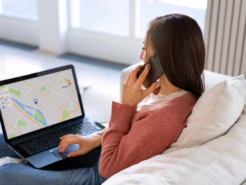 Local SEO checklist for an Alberta service business shown on a laptop