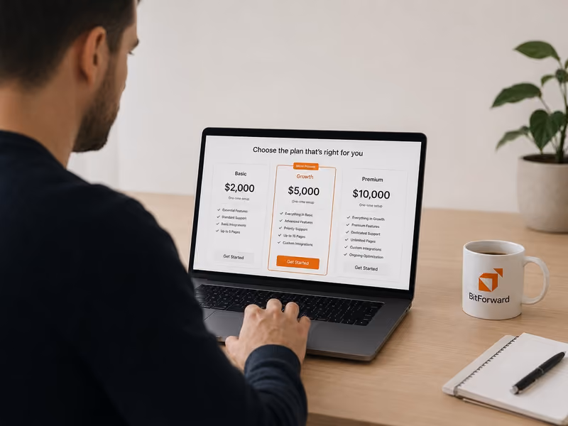 A Canadian service business owner reviewing website pricing options on a laptop