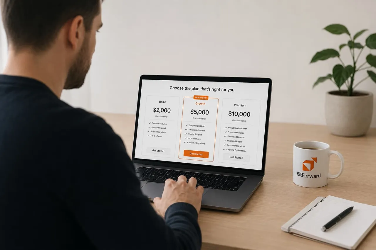 A Canadian service business owner reviewing website pricing options on a laptop